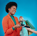 Phone, machine and woman in shopping bag, POS and online payment, digital service or fashion fintech. Retail, mobile and cashier, african customer or people at point of sale on blue studio background