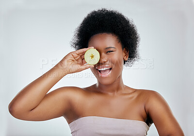 Buy stock photo Happy black woman, portrait and apple for diet, natural nutrition or health against a white studio background. Face of African female person smile with organic fruit for fiber, vitamins or body care