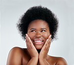 Skincare, health and female model in studio with a natural, wellness or cosmetic face routine. Beauty, young and headshot of an African woman with facial dermatology treatment by a gray background.