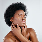 Beauty, afro and black woman in portrait with skincare or cosmetics in studio background. Dermatology, hand and face african girl with natural hair for treatment with shine for wellness in mock up.