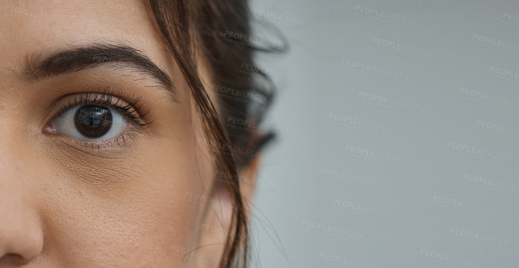 Buy stock photo Woman, eye and zoom in portrait by space, mockup or health for vision, contact lens or biometric test. Girl, model and closeup for cybersecurity banner, retina or cornea scan for safety by background