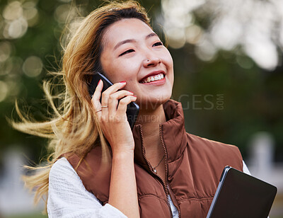 Buy stock photo Happy, talking and a woman on a phone call while thinking in the city for business or networking. Smile, idea and an Asian employee with communication on a mobile for conversation, chat or planning