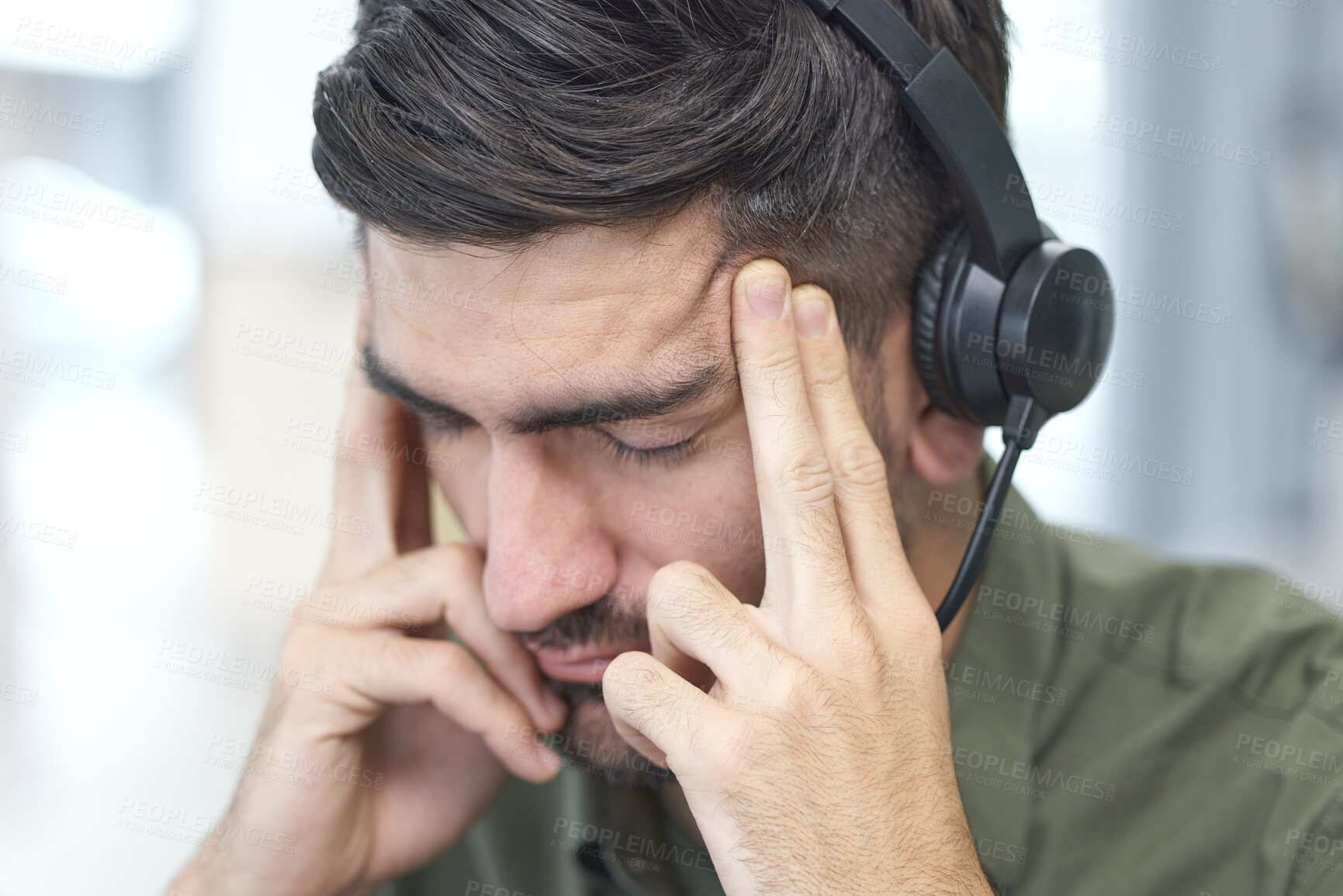 Buy stock photo Man, headache and call center in stress, mistake or client problem in customer service or support at office. Male person, consultant or agent with headphones and bad head pain in burnout at workplace