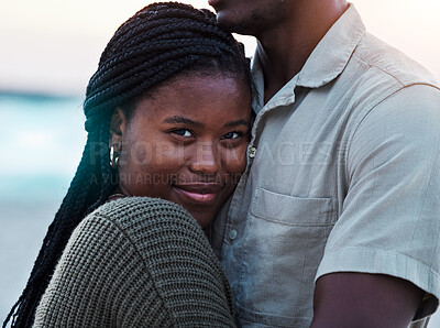 Buy stock photo Black couple, hug and portrait outdoor at beach with love, care and commitment or security. Smile on face of young african woman and man together on vacation, holiday or travel adventure in Jamaica