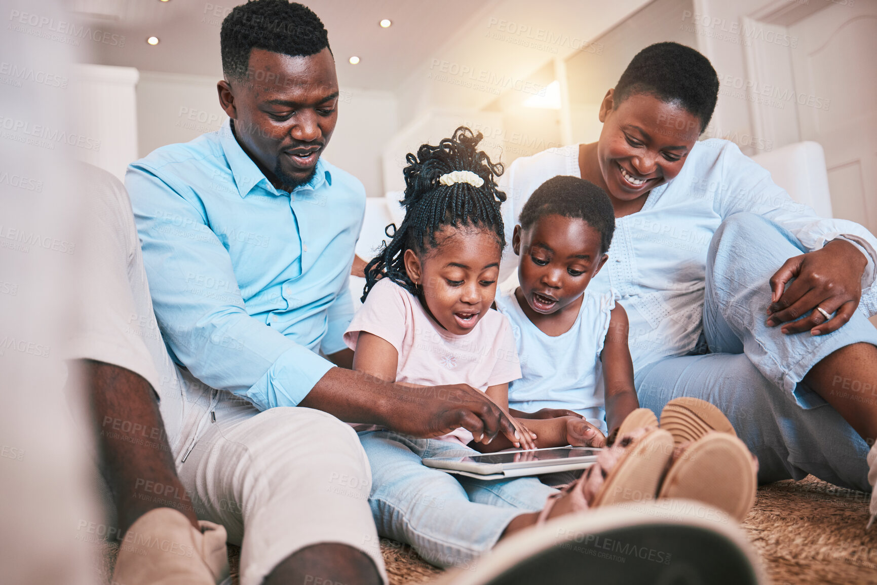 Buy stock photo Relax, happy and tablet with black family in living room for streaming, games and elearning app. Digital, technology and internet with parents and children at home for movies, education and network