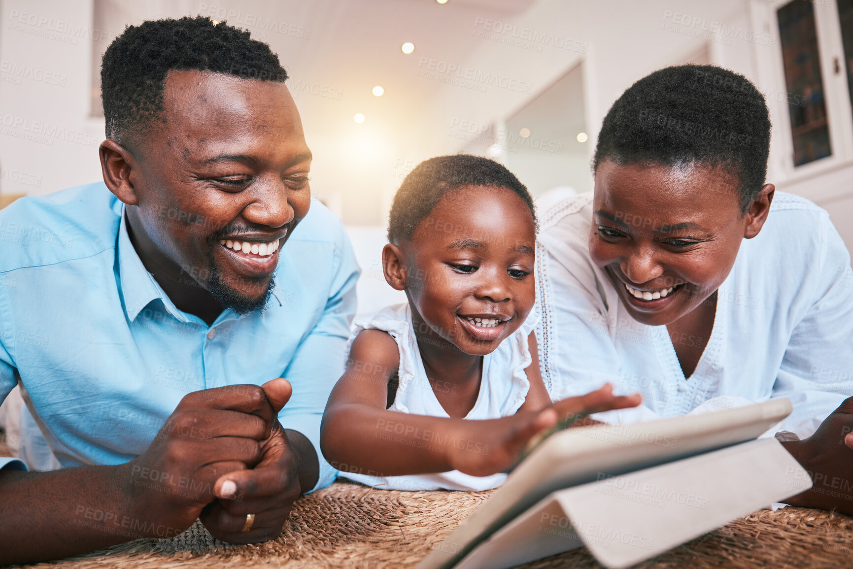 Buy stock photo Digital happy and tablet with black family in living room for streaming, online games and elearning app. Relax, technology and internet with parents and child at home for movies, education or network