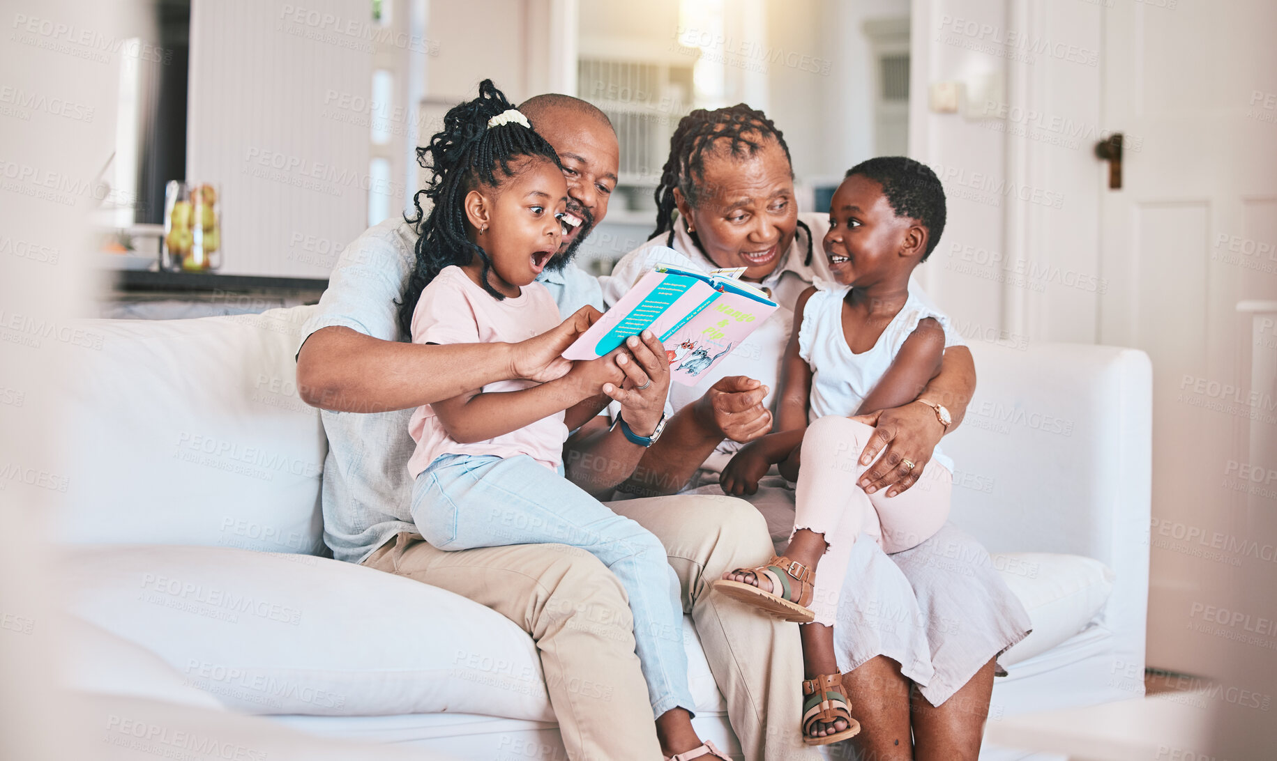 Buy stock photo Learning, reading book and black family with surprise on sofa in home living room. African grandpa, grandma and storytelling with kids, wow and shocked on couch for education, study and bonding