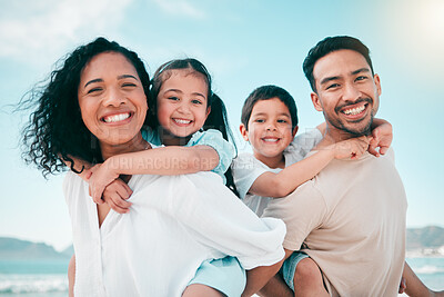 Buy stock photo Family on beach, parents piggyback children in portrait with bonding on holiday, happy people and smile with travel. Mom, dad and young kids, tropical vacation in Mexico with love and care outdoor