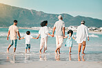 Grandparents, parents or children holding hands at beach as a big family for holiday vacation travel together. Grandfather, grandmother or back of mom walking with dad, love or kids at sea to relax