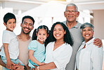 Happy, excited and portrait of big family together in the backyard of their modern house. Happiness, smile and children bonding and posing with their grandparents and parents in garden by their home.