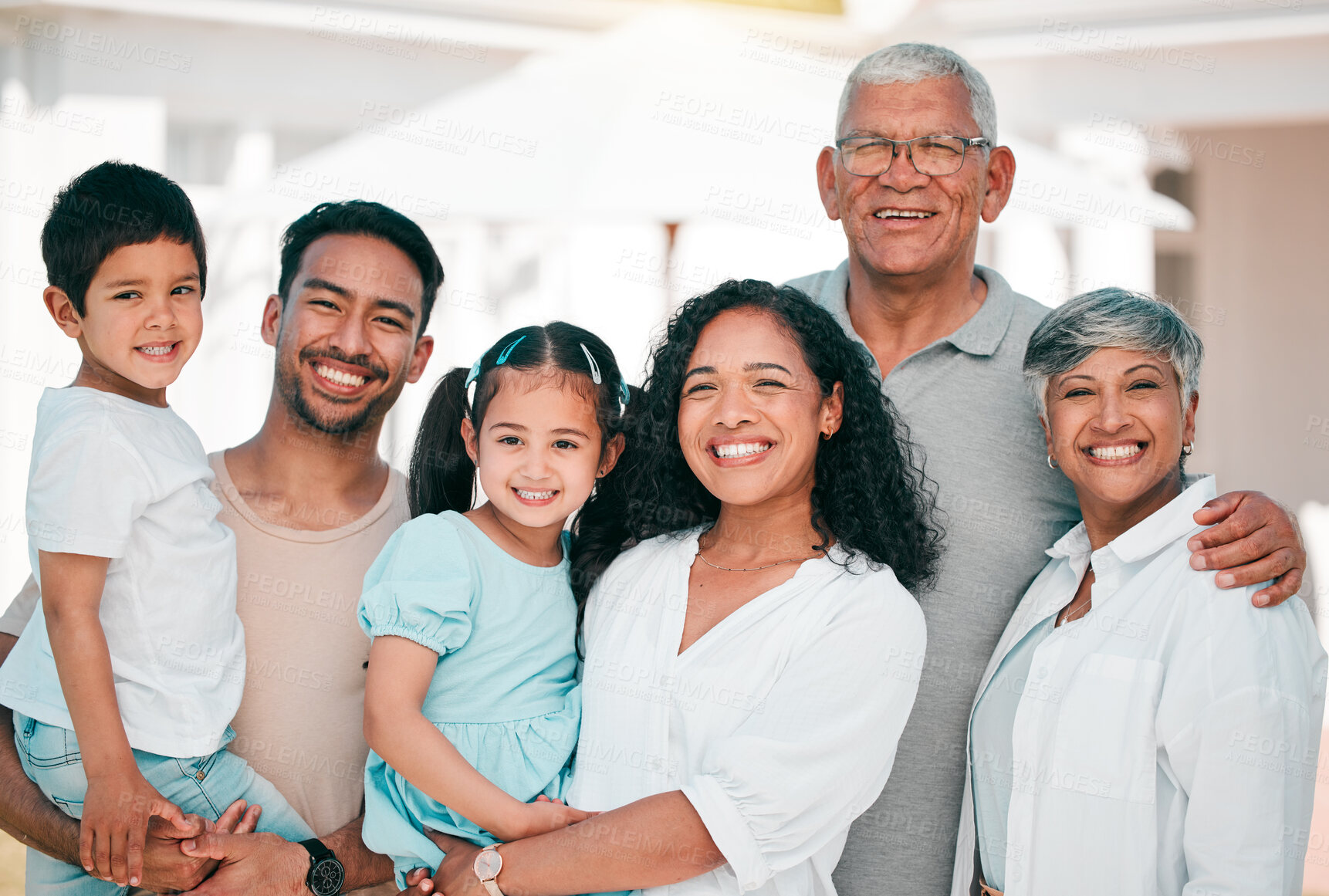 Buy stock photo Happy, excited and portrait of big family together in the backyard of their modern house. Happiness, smile and children bonding and posing with their grandparents and parents in garden by their home.