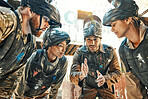Paintball team, meeting and idea for game plan, collaboration or strategy on the battle field together. Group of paintballers in war discussion, teamwork or speech for motivation before match start