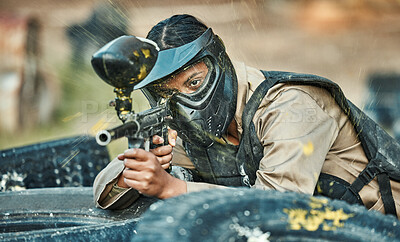 Buy stock photo Paintball, sports and woman in action with gun for tournament, competition or battle in park. Soldier, military and female person shooting in outdoor arena for training, adventure games and challenge