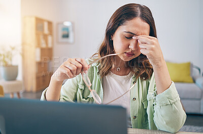 Buy stock photo Headache, stress and woman on laptop in home with deadline for project, report and online task. Remote work, overworked and female person with burnout, frustrated and worry for freelance business