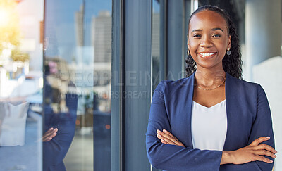 Buy stock photo Portrait, window and arms crossed with a business black woman standing in her professional office. Smile, corporate leadership with a happy female manager or boss in the workplace for empowerment