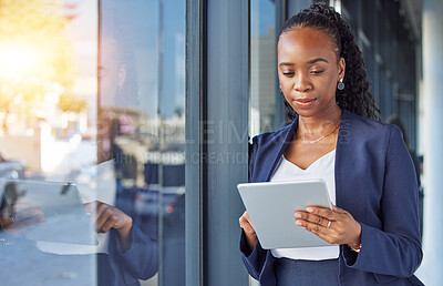 Buy stock photo Business, black woman with internet and tablet at window in office, thinking and ideas in research. Email, digital work and insight, businesswoman and online review planning with feedback for project