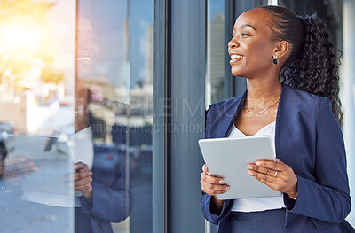 Buy stock photo Happy woman, thinking and tablet at window in office, smile and ideas for future in online career. Happiness, digital work and businesswoman with email review, planning and feedback for internet job.