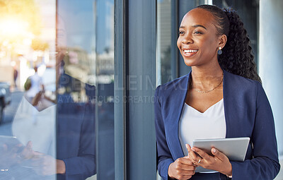 Buy stock photo Business, black woman with smile and tablet at window in office, thinking and ideas for online career. Happiness, digital work and businesswoman with insight for planning feedback for internet job.