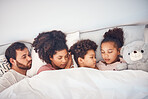 Sleeping, above and family in a bed with love, dreaming and resting in their home cosy together. Sleep, top view and children with parents in a bedroom nap, peaceful and hugging, comfort and bond
