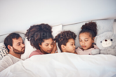 Buy stock photo Sleeping, above and family in a bed with love, dreaming and resting in their home cosy together. Sleep, top view and children with parents in a bedroom nap, peaceful and hugging, comfort and bond