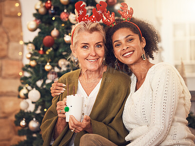 Buy stock photo Portrait, christmas and blended family with a woman and daughter in law together in a home during the festive season. Smile, love and diversity with happy people in a house for december celebration