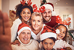 Christmas, portrait and selfie of big family in home, bonding and together. Xmas, smile and face of parents, children and grandparents, interracial or profile picture at party, celebration or holiday