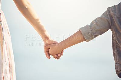 Buy stock photo Love, support and holding hands with mother and child for trust, happy and safety on blue sky. Happiness, security and faith with closeup of woman and kid for family, care and kindness together