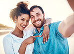 Selfie, holiday and happy couple celebrate engagement, marriage and beach memory on social media. Digital photography, man and woman relax on ocean vacation together with smile, love and wedding ring