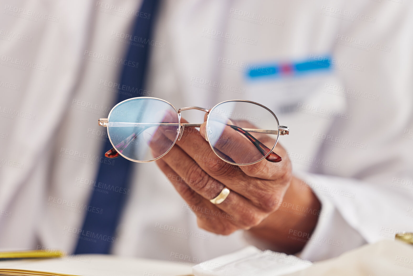 Buy stock photo Professional, man and hands with glasses for vision or prescription lens for eyesight. Closeup, eyewear and frames male person with spectacles for wellness in workplace for focus with seeing.