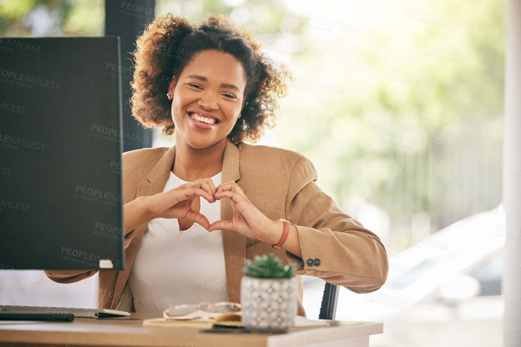 Buy stock photo Portrait, business woman and smile with heart hands in office for care, kindness or love emoji. Happy young African female worker with finger shape for thank you, trust and like of support in agency

