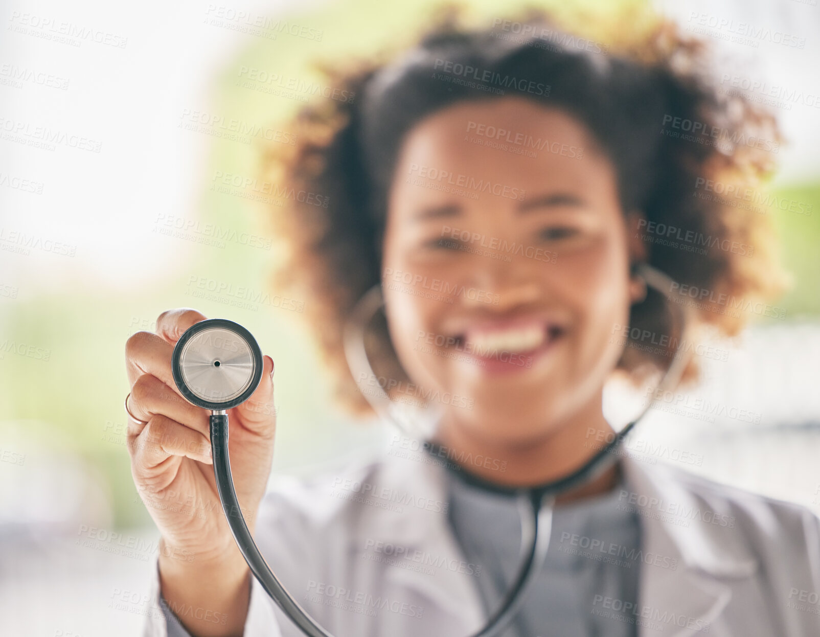 Buy stock photo Healthcare, stethoscope and cardiology with a doctor in the hospital for a routine checkup during an appointment. Medical, hand and heart health with a woman medicine professional in a clinic