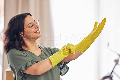 Buy stock photo Woman, hand and gloves for cleaning service in home for safety from germs, bacteria in living room. Happy, girl and disinfect in apartment for dirt with household maintenance for dust or virus.