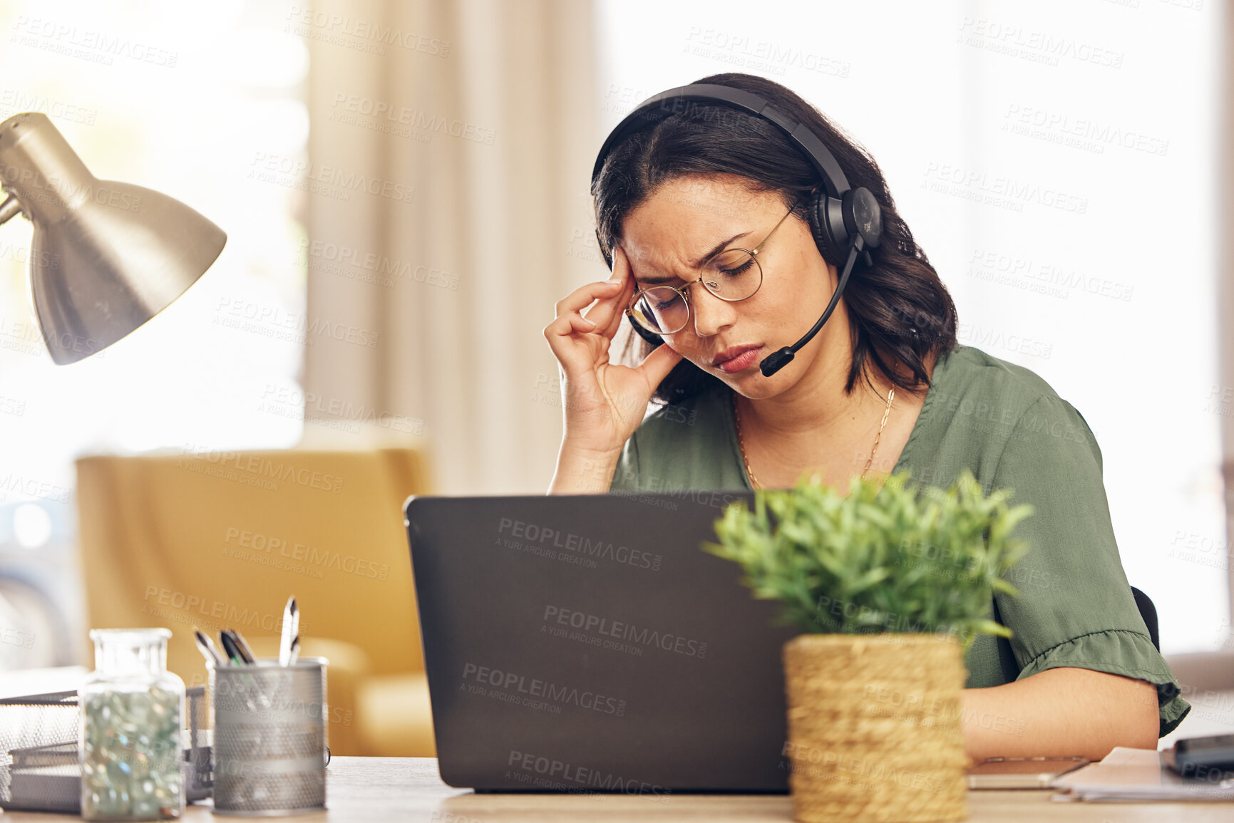 Buy stock photo Remote work, laptop and woman with a headache, headphones and fatigue with health issue. Female person, freelancer and telemarketing agent with a migraine, burnout and overworked with pain and tired
