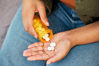 Buy stock photo Hands, above and a person with a bottle of medicine for pain, supplement or vitamin c. Closeup, container and a patient with pills, tablet or medical support for mental health, anxiety or virus