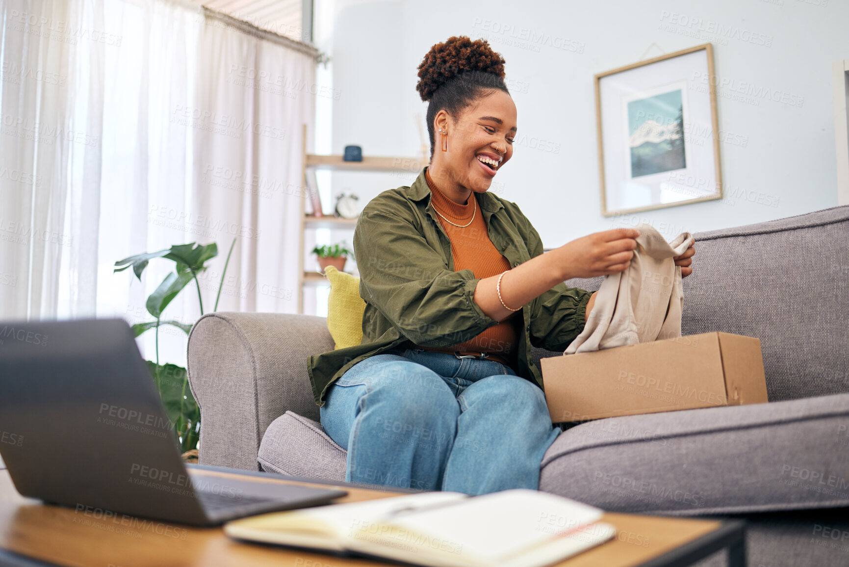 Buy stock photo Online shopping, woman on sofa with package and smile, discount fashion retail and laptop in living room. Delivery of clothes, ecommerce and happy person on couch with box from website sale or deal.