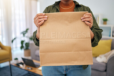 Buy stock photo Delivery, fast food and woman with hand holding package order at home. Closeup, parcel and customer with paper bag from online shopping, ecommerce with mockup space for branding, advertising or logo
