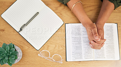 Woman hands, bible and prayer in top view of spiritual faith, holy gospel and trust to worship God. Closeup of person praying with christian books, studying religion or reading praise to jesus christ