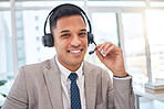 Happy man, portrait and call center with headphones in customer support, service or telemarketing at office. Male person, consultant or agent smile for online advice, help or contact us at workplace