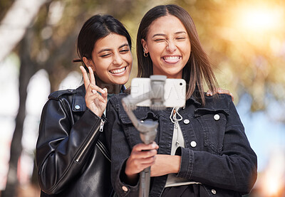 Buy stock photo Smile, selfie and peace sign with friends in city for social media, happy and support. Happiness, profile picture and live streaming with women in outdoor for internet, post and youth together