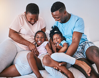 Buy stock photo Happy, laugh and black family on a bed with games, tickle and bonding in a home on the weekend. Love, playing and children with parents in a bedroom, playful and having fun in the morning a house 