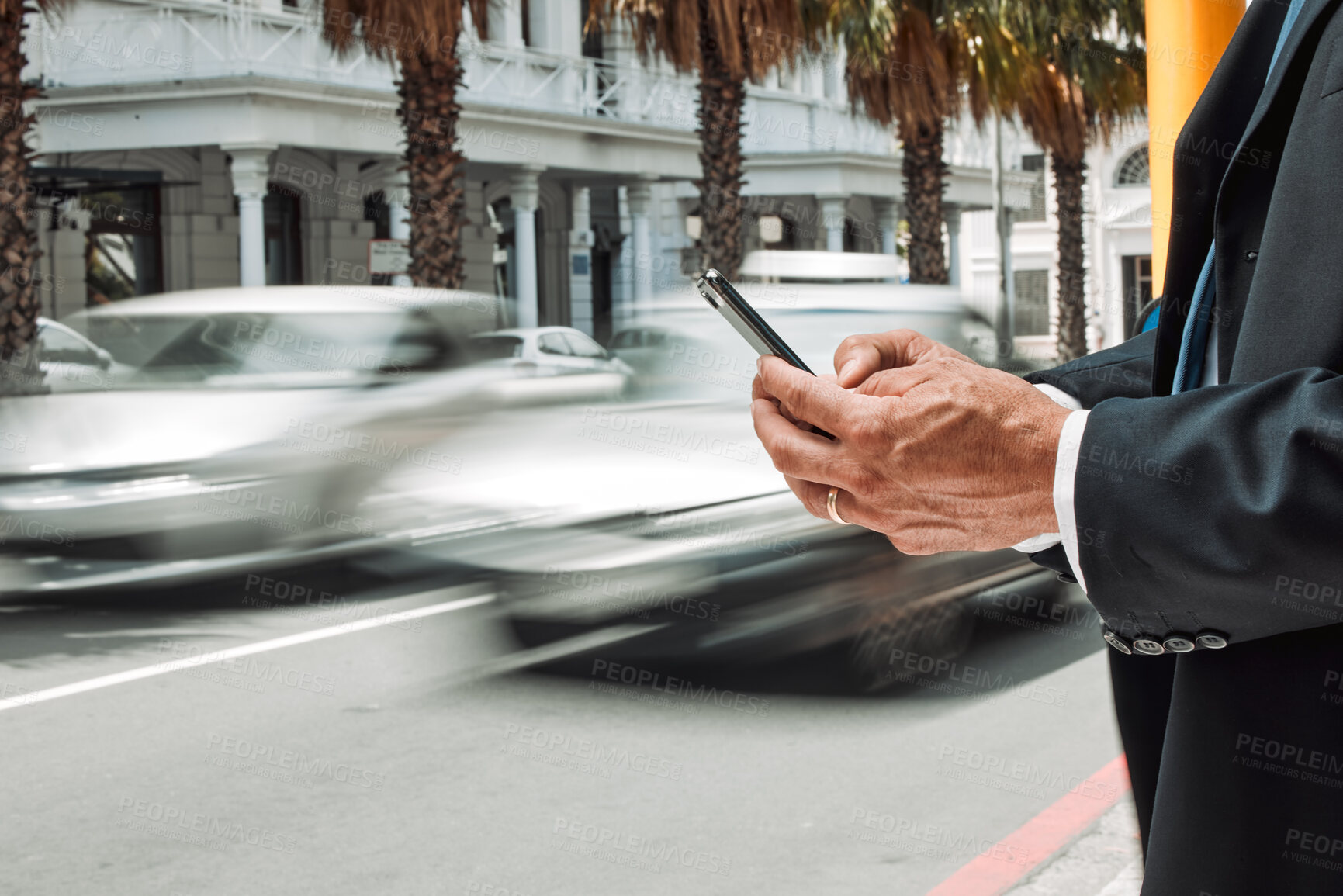 Buy stock photo Hands, phone and commute with a business man in the city using an app for location, navigation or direction. Mobile, travel and communication with a male employee typing a message in an urban town