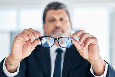 Buy stock photo Man, hands and holding glasses at work for vision, bluelight security and cleaning lens. Closeup, bokeh and a mature corporate employee with eyewear for eyes support, frame and help with eye care