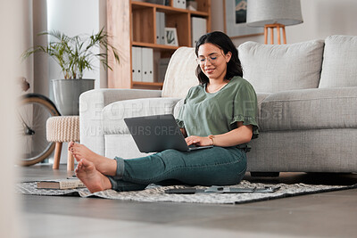 Buy stock photo Woman, remote work and laptop on floor of living room for digital planning, online research and elearning. Happy freelancer working on computer technology for telework, social media and blog at home