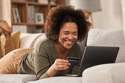 Buy stock photo Black woman, credit card and laptop on sofa for online shopping, digital payment and fintech account. Happy female person, computer banking and money for sales, password and ecommerce finance at home