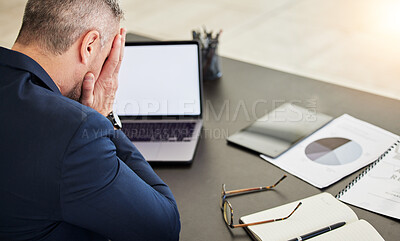 Buy stock photo Business man, headache and tired by laptop, report and chart documents with mockup space on screen. Mature CEO, boss or leader with hands on face, paperwork and pc for audit, accounting and fatigue