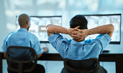 Buy stock photo Security guard, safety and team in control room with a computer screen for surveillance. Behind a man and woman officer relax in office for crime investigation with cctv monitor and camera footage