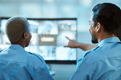 Buy stock photo Safety, security guard team and control room with a computer screen for surveillance. Behind a woman and man pointing at cctv monitor for crime investigation, supervision and monitoring live camera