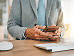 Business man, hands and phone at desk with networking, text and online communication. Computer, mobile message and social media browse in a office and workplace with contact and typing at company