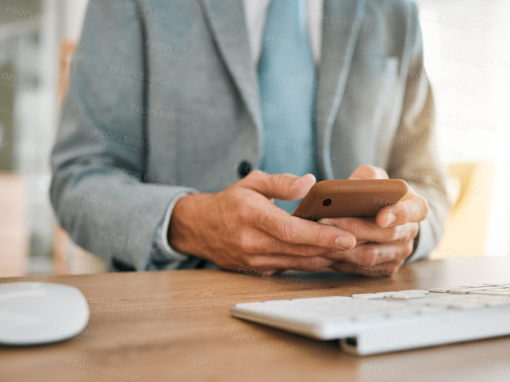 Buy stock photo Business man, hands and phone at desk with networking, text and online communication. Computer, mobile message and social media browse in a office and workplace with contact and typing at company