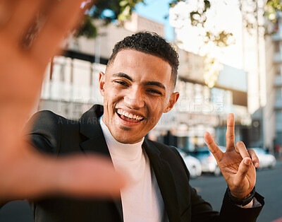 Buy stock photo Selfie, peace sign and portrait of business man in city for social media, profile picture and post. Travel, professional and face of male worker with hand gesture excited for career, job and success